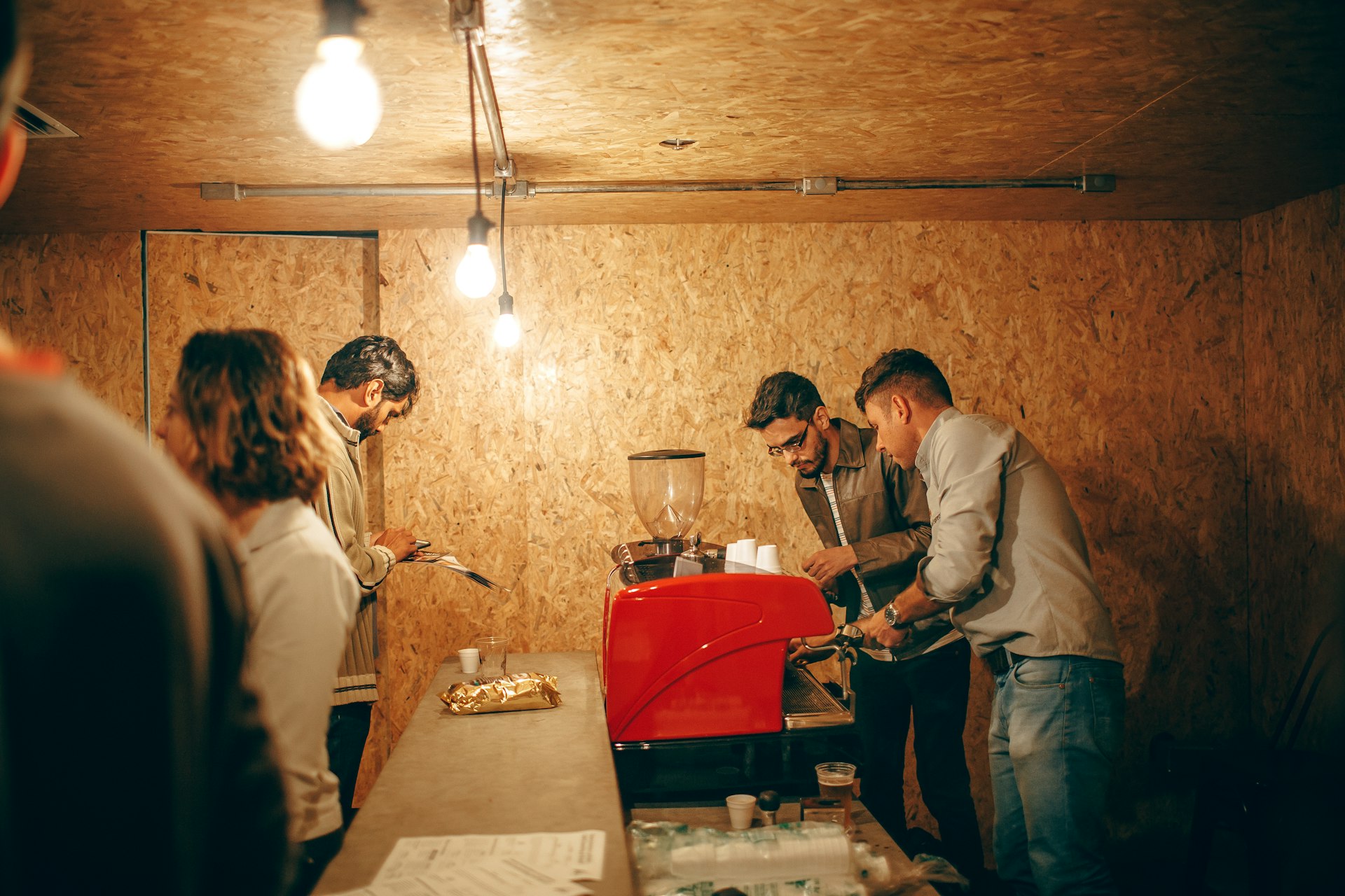 man in white dress shirt playing guitar